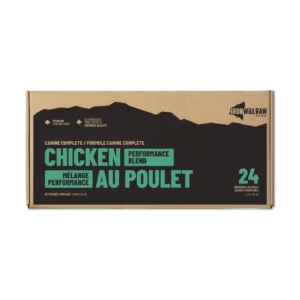 Iron Will Raw Chicken Performance Blend 24 lbs in a cardboard box with English and French text, featuring a mountain silhouette graphic.