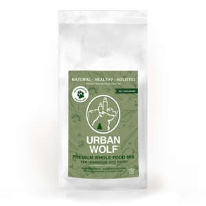 A white bag labeled "Urban Wolf Large 5 kg 11lb" with a green city skyline and tree logo, featuring text that highlights its natural, healthy, and holistic ingredients.