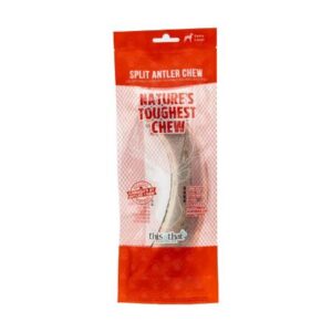 A red and white package labeled "Split Antler Chew - Nature's Toughest Chew" contains a natural dog chew. The packaging is clear in the center, showing the antler inside.