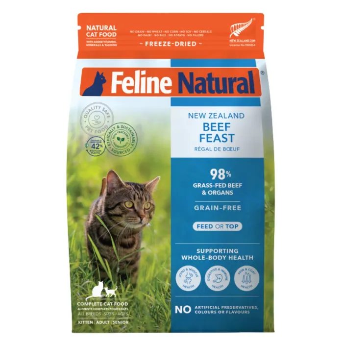 Bag of Feline Natural New Zealand Beef Feast freeze-dried cat food with a brown tabby cat pictured on the front.