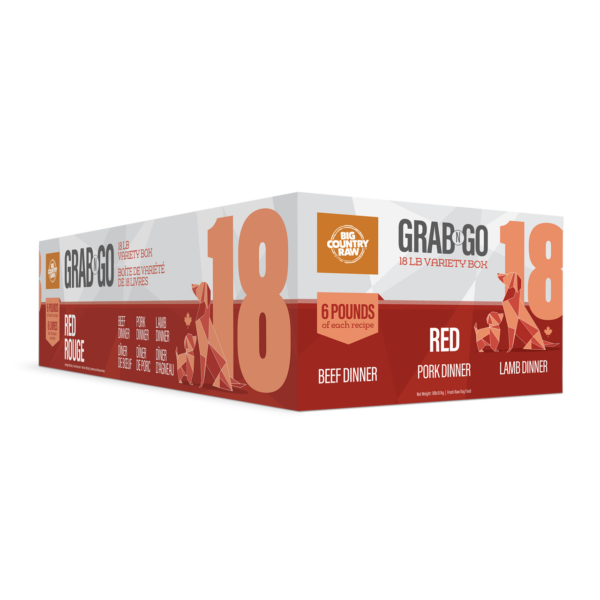 A rectangular box labeled "Big Country Raw Grab N GO Red 18 lbs" featuring Beef Dinner, Pork Dinner, and Lamb Dinner, with bold red and orange graphics and the number 18 prominently displayed.