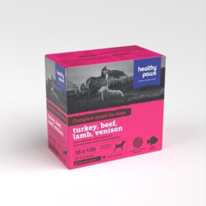 A pink and gray box of Healthy Paws Turkey, Beef, Lamb, Venison Canine Complete 8 lbs, featuring an image of sheep and a dog; contains 16 x 340g raw complete meals for dogs.