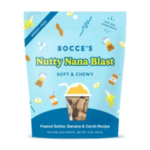 A blue package of Bocce's Nutty Nana Blast soft and chewy dog treats, featuring peanut butter, banana, and carob. The bag displays playful banana and treat illustrations and highlights "wheat-free" and "100% real ingredients.
