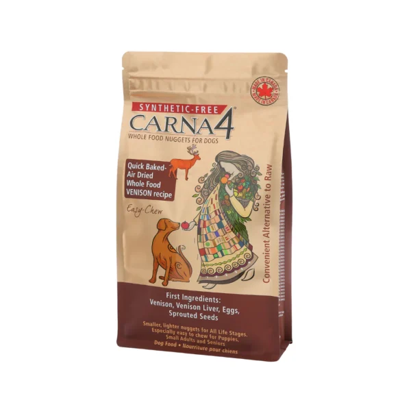 A bag of Carna4 synthetic-free dog food. The packaging highlights "Quick Baked," "Air Dried," and "Venison recipe." An illustration of a woman and a dog is on the front, with text emphasizing whole food ingredients like venison and sprouted seeds.