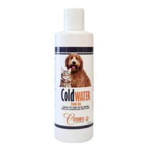 A white bottle of Cold Water Fish Oil with a label showing a dog and a cat. The product is by Carnivora and is intended for pets.