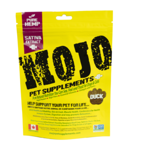 Bright yellow bag of Mojo Pet Supplements for dogs and cats, duck flavor. The package features bold black text, a Pure Hemp Sativa Extract badge, and details about its health benefits and natural ingredients.