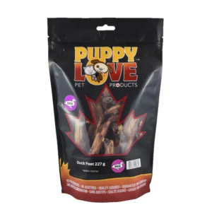 A black and red package of Puppy Love Pet Products containing 227 grams of duck feet. The packaging features a cartoon dog and cat, a maple leaf design, and text claiming quality assurance with no additives.