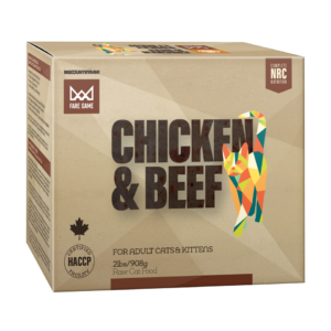 A cardboard box of Fare Game Chicken & Beef raw cat food for adult cats and kittens, featuring geometric animal graphics and product information on the front.