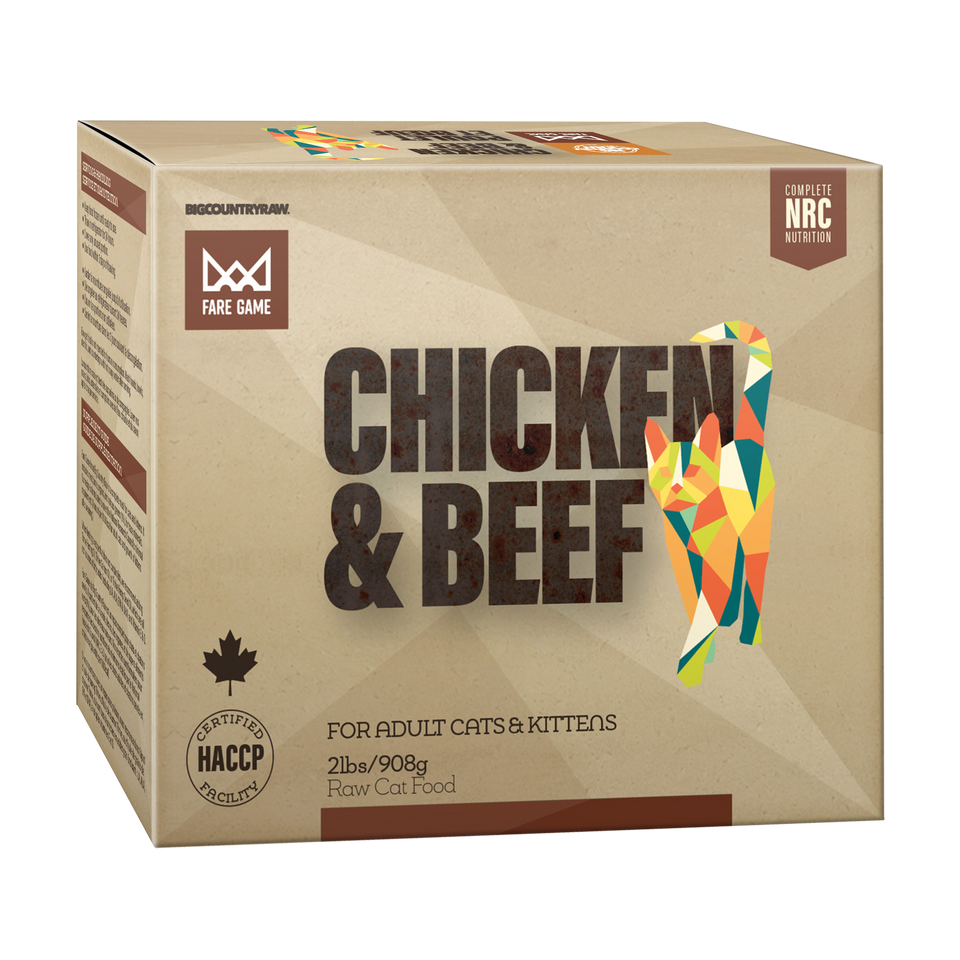 A cardboard box of Fare Game Chicken & Beef raw cat food for adult cats and kittens, featuring geometric animal graphics and product information on the front.