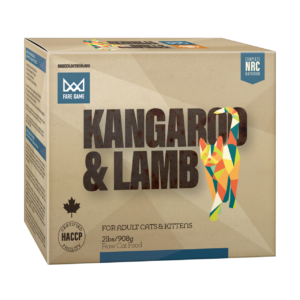 The product is a 2lbs/908g rectangular box of "Fare Game Kangaroo & Lamb" raw cat food featuring beige packaging with multicolored text and silhouettes of a kangaroo and lamb, suitable for adult cats and kittens.