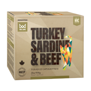 Big Country Raw Fare Game Turkey & Sardines with Beef, 2lbs/908g, for adult cats and kittens, features a colorful geometrical cat design on the package and is certified HACCP with complete NRC nutrition.