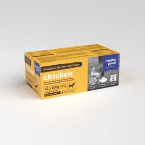 A yellow and brown box of Healthy Paws Chicken Complete 12x100g for small dogs, featuring icons for healthy digestion, animal protein, and grain-free. Contains 12 packs of 100g each.