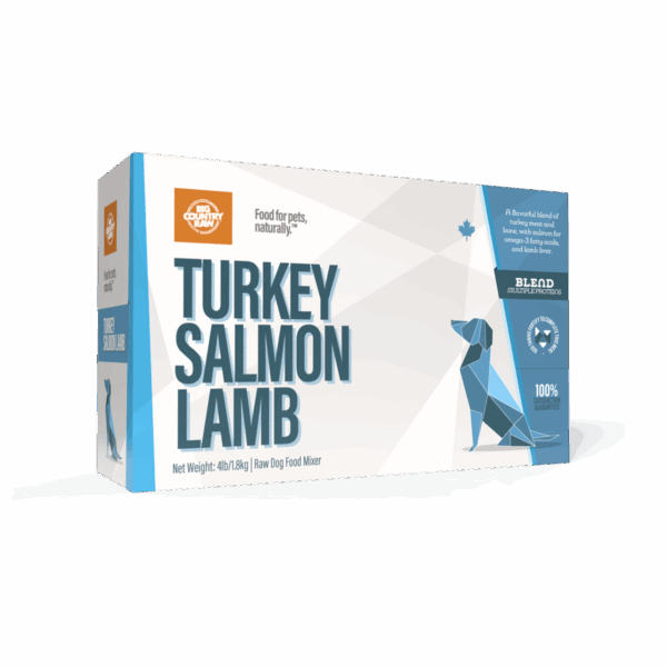A rectangular box of Big Country Raw Turkey/Salmon/Lamb 4x1lb raw dog food mixer, with geometric dog artwork, blue and white design, net weight (4lb/1.8kg), and labeled as 100% natural ingredients.