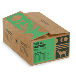 A closed cardboard box labeled “Bold Nature Mega Variety 24lbs,” featuring green and black graphics, a dog illustration, and product details—designed for pet food or treats.
