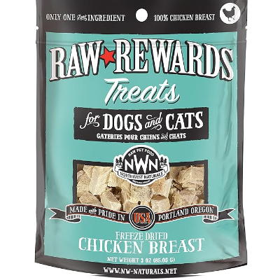 A package of Raw Rewards Treats for dogs and cats. The bag is turquoise with black and white lettering and features images of freeze-dried chicken breast. The label states it is made in the USA by Northwest Naturals.