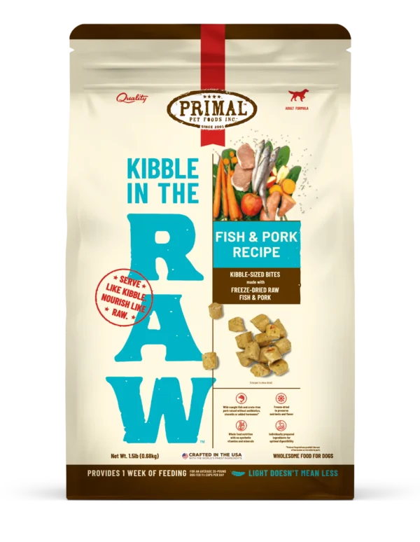 The Primal Kibble in The Raw Fish & Pork Recipe 1.5 lb packaging features vibrant images of vegetables, fish, and pork, underscoring the natural raw nutrition in kibble-sized bites, with a focus on quality ingredients similar to traditional kibble.