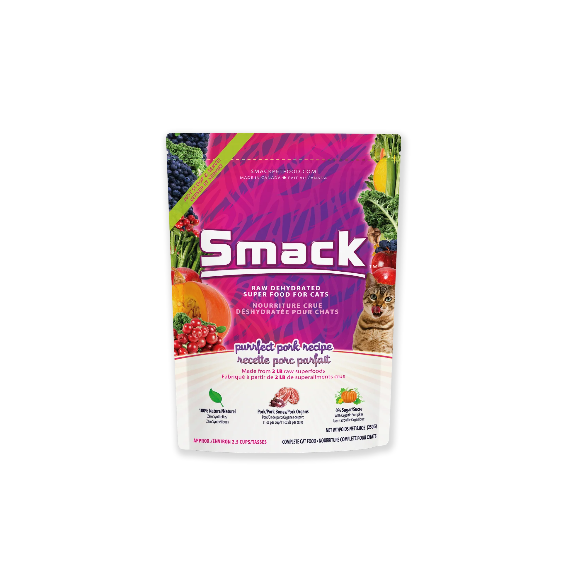 A colorful bag of Smack cat food labeled "Purrfect Pork Recipe." The package features images of fruits, vegetables, and a cat, and highlights that the food is raw, dehydrated, and made with natural ingredients.