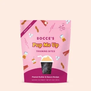 A pink 170g bag of Bocce’s Pup Me Up Training Bites, featuring peanut butter & bacon flavor and playful packaging illustrations of bacon, peanut butter jars, and treats.