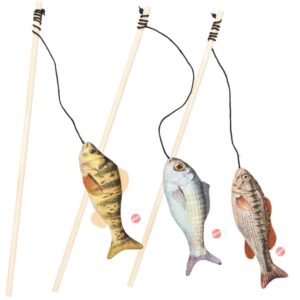 Three wooden fishing rods with black strings, each holding a realistic-looking fabric fish toy in different colors and patterns, arranged upright against a white background.