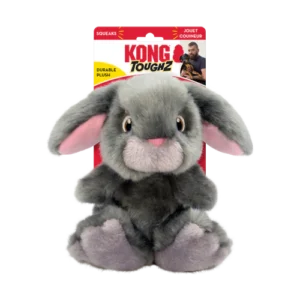 A gray plush bunny toy with pink inner ears and feet, featuring brown eyes and a white nose. The toy is part of the "Kong Toughz" collection, indicated by the packaging that highlights its durability and includes a squeaker.