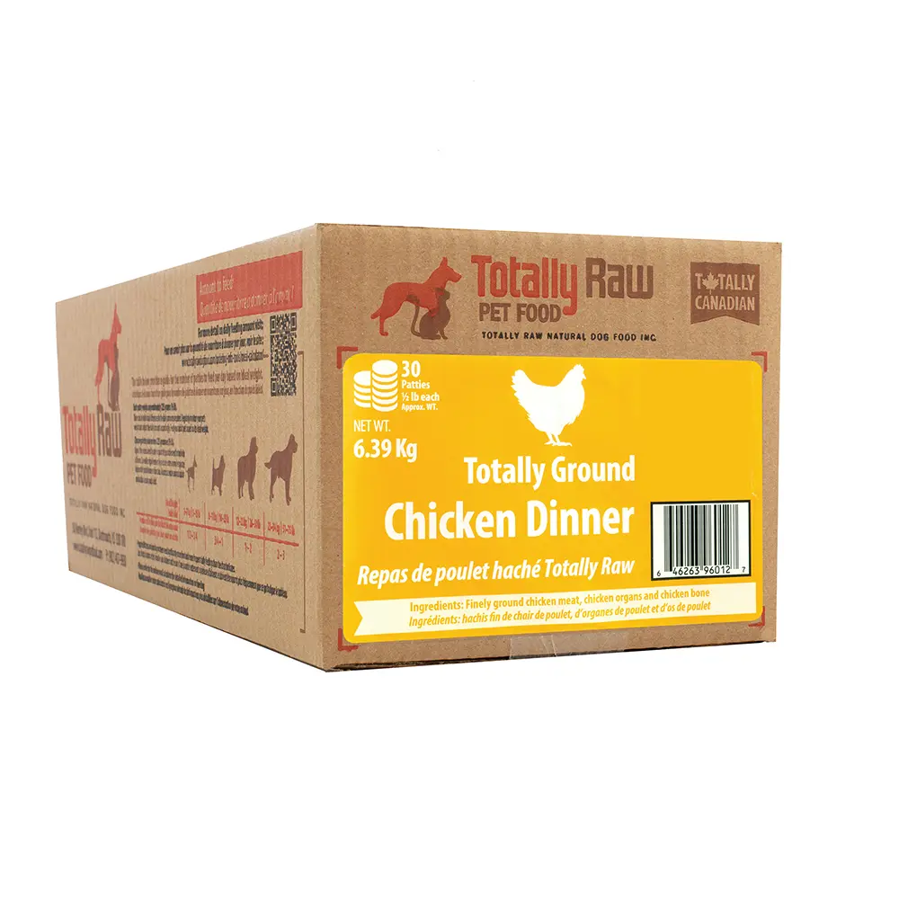 A brown and yellow box labeled "Totally Raw Pet Food: Totally Ground Chicken Dinner, 6.39 kg," featuring a chicken silhouette and text in English and French, indicating raw pet food for dogs.