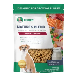 A 454 g bag of DR.MARTY Nature’s Blend Healthy Growth puppy food featuring a puppy sitting next to a kibble viewing window, with images of meat, fruit, and vegetables on the side.