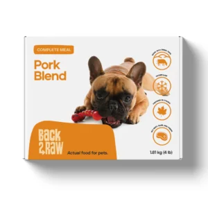 A 1.81 kg (4 lb) box of Back2Raw Pork Blend pet food features a French Bulldog with a red toy, and icons showing it’s grain-free, all-natural, made in Canada, and has no preservatives.