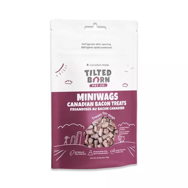 A bag of Tilted Barn Pet Co. Miniwags Canadian Bacon Treats for dogs, featuring an image of the treats and text in English and French on a white and maroon package.