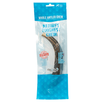 A clear plastic package containing a whole antler dog chew labeled “Nature's Toughest Chew!” and “Whole Antler Chew” for extra-large dogs. The package is blue with paw print patterns and displays a natural antler inside.