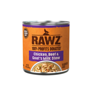 A can of RAWZ Chicken, Beef & Goat's Milk Stew. The label highlights "100% Profits Donated" and "No Artificial Ingredients Added." The label is primarily orange and purple with an image of the stew at the bottom.