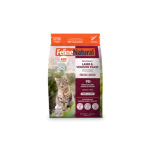 A bag of Feline Natural cat food featuring a photo of a tabby cat outdoors. The label reads “Lamb & Venison Feast, Freeze-Dried.” Key points highlight natural ingredients, grain-free, and high meat content.