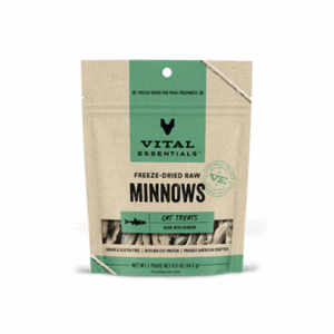 A brown and green resealable bag of Vital Essentials Freeze-Dried Raw Minnows cat treats, showing small fish inside the package. The label highlights that the product is grain and gluten free.