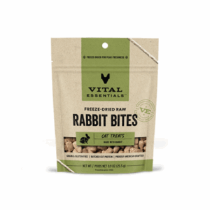 A beige and green bag of Vital Essentials Freeze-Dried Raw Rabbit Bites cat treats, labeled grain and gluten free, single cat protein, and made with rabbit. The package shows small bite-sized treats inside.