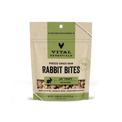A beige and green bag of Vital Essentials Freeze-Dried Raw Rabbit Bites cat treats, labeled grain and gluten free, single cat protein, and made with rabbit. The package shows small bite-sized treats inside.