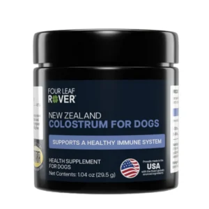 A black jar labeled โFour Leaf Rover Bovine Colostrum 33 gโ with a blue stripe, noting it supports a healthy immune system and is made in the USA. This premium Four Leaf Rover supplement has a net weight of 33 g (1.16 oz).