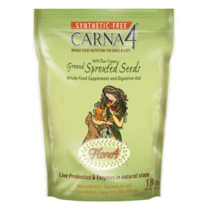 A green pouch of Carna4 Flora4 Ground Sprouted Seeds Food Topper 510 g for dogs and cats features an illustration of a woman with a cat and dog, along with product details and benefits printed on the packaging.