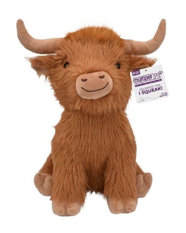 A plush toy resembling a brown Highland cow with long fur and large curved horns. It has a smiling face and a tag that reads "multipet" hanging from one ear.