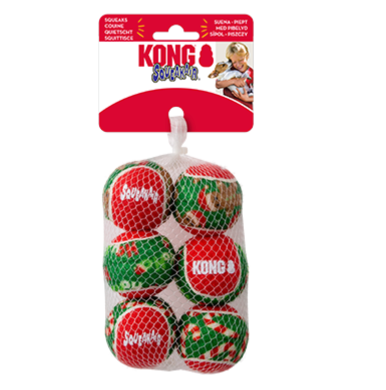 The Kong Holiday SqueakAir Ball Small 6pc includes six red, green, and white tennis balls for dogs in a mesh bag, featuring festive colors and KONG branding with an image of a dog on the packaging.