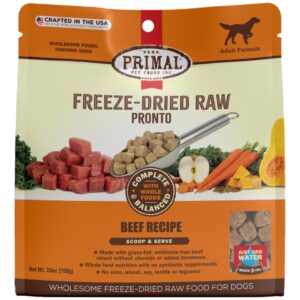 A package of Primal Pet Foods Freeze-Dried Raw Pronto for dogs, featuring the beef recipe. The bag shows chunks of raw beef, carrots, broccoli, and squash. It highlights "Complete & Balanced," "Adult Formula," and "Just Add Water." Net weight: 25oz (708g).