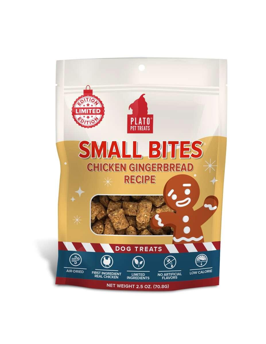 A bag of Plato Pet Treats, labeled "Small Bites Chicken Gingerbread Recipe." The package features star designs and an illustration of a gingerbread figure with a wagging tail. It highlights limited edition, air-dried, limited ingredients, and no artificial flavors.