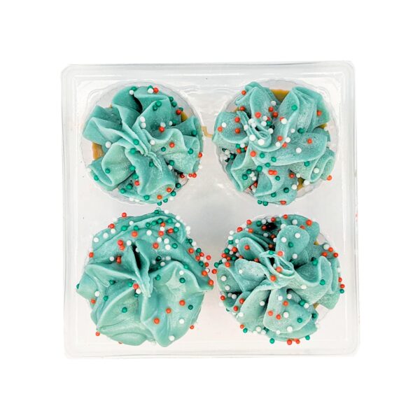 Four cupcakes with light blue frosting, each topped with colorful sprinkles, are arranged in a clear plastic container. The cupcakes are seen from above, showcasing their decorative swirls and vibrant toppings.