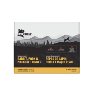 A 3 lb box of Iron Will Raw Feline Complete Rabbit, Pork, Mackerel Dinner featuring a mountain design and bilingual English and French product information.