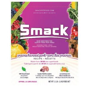 A vibrant 2.5kg bag of Smack Prairie Harvest Pork for Dog, adorned with images of fruits, vegetables, and a dog. The packaging emphasizes raw superfoods and nutritional benefits.