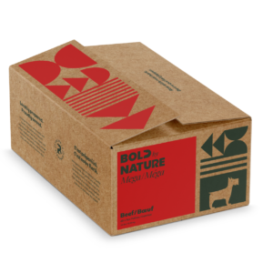 A brown cardboard box with red and green geometric designs, labeled “Bold Nature Mega Beef 24lbs,” featuring a dog icon on the front corner.