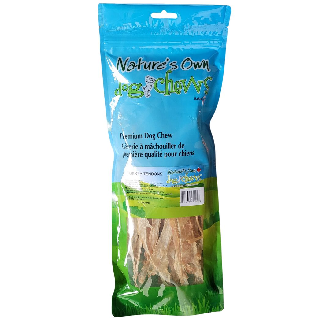 A blue bag of Nature’s Own Chew Turkey Tendons 70 gr, labeled “Premium Dog Chew,” featuring English and French text on the packaging.