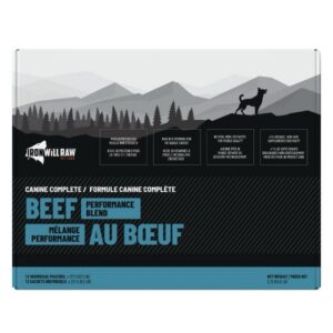 Iron Will Raw Canine Complete Beef Dinner 12 lbs cardboard box featuring a mountain landscape graphic, text detailing nutritional benefits, and a label indicating twelve individual pouches totaling 2.72 kg.