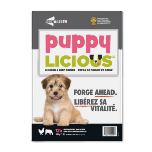 A 12 lbs bag of Iron Will Raw Puppylicious Beef & Chicken featuring a small, light-brown puppy and text that reads โpuppy LICIOUS, Chicken & Beef Dinner.โ