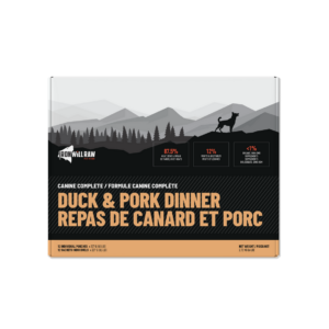 Box of Iron Will Raw Canine Complete Duck & Pork 6 lbs featuring a silhouette of a dog in a mountain landscape, labeled “Duck & Pork Dinner” in English and French, with nutritional percentages listed.