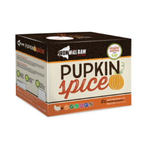 The image shows a package of Iron Will Raw "Pupkin Spice" dog food. It features fall-themed colors and a pumpkin illustration. The box offers a limited edition and a discount of $3 off.