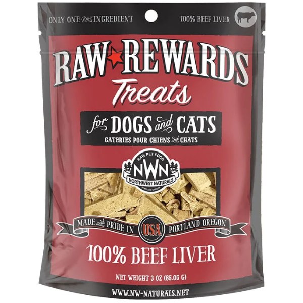 A package of Raw Rewards Treats for dogs and cats, featuring 100% beef liver. The front of the bag is primarily red, with text highlighting "Made with pride in USA," and "Portland Oregon." The treats are visible through a clear window.